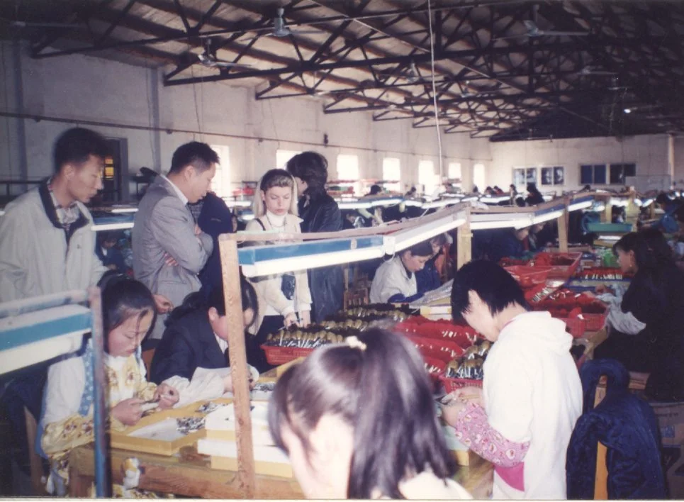 Baosheng production floor, 1980 — international buyers on site