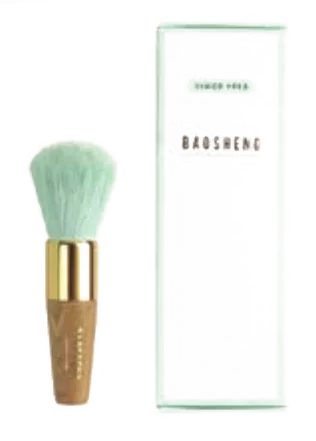 Woodgrain-handled brush with its mint box