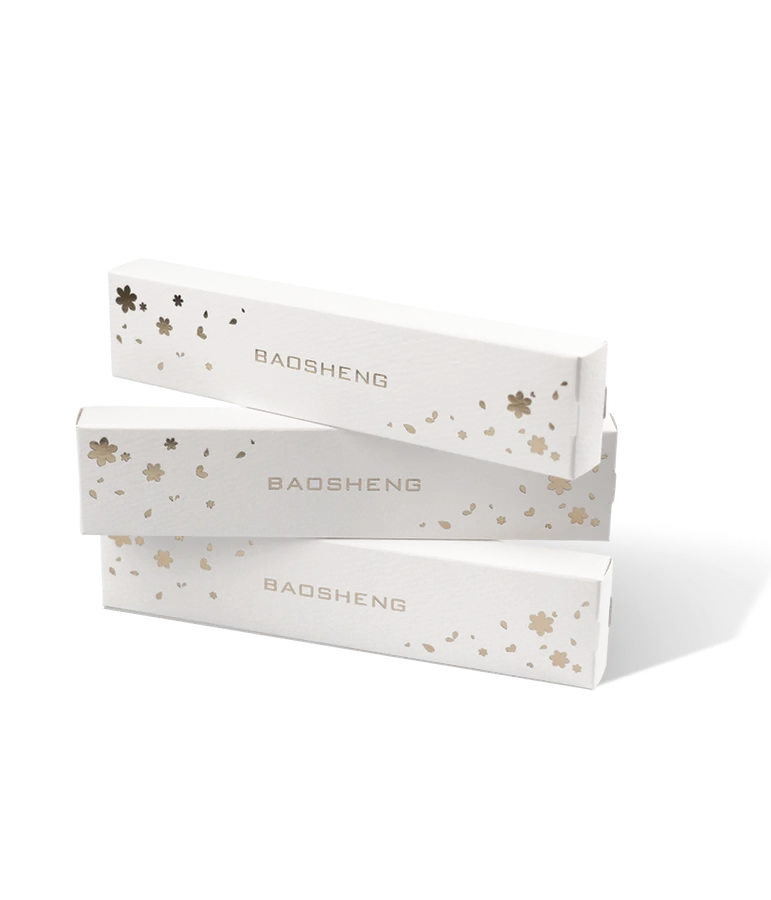 Two white boxes with gold stars